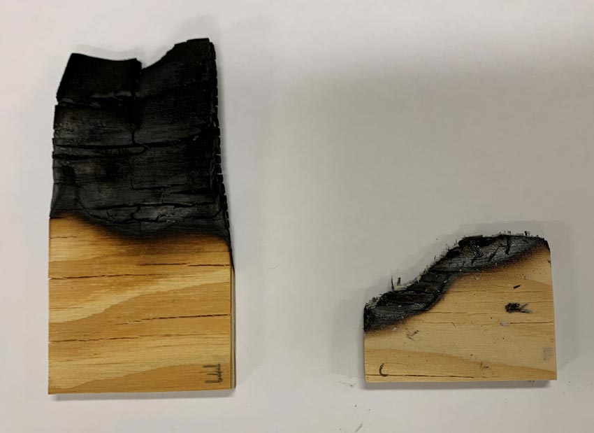 Fire-resistant coating demonstration a piece of charred wood on the left and a piece of wood that has been almost entirely burnt away on the right