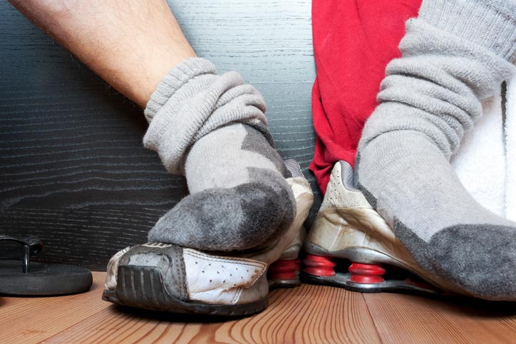Smell perception content a man with sweaty socks and shoes