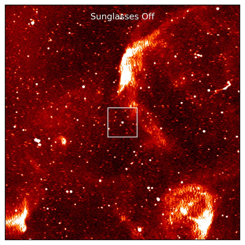 Image labelled sunglasses off showing dozens of stars and clouds against a dark red background, with one small white dot highlighted by a box