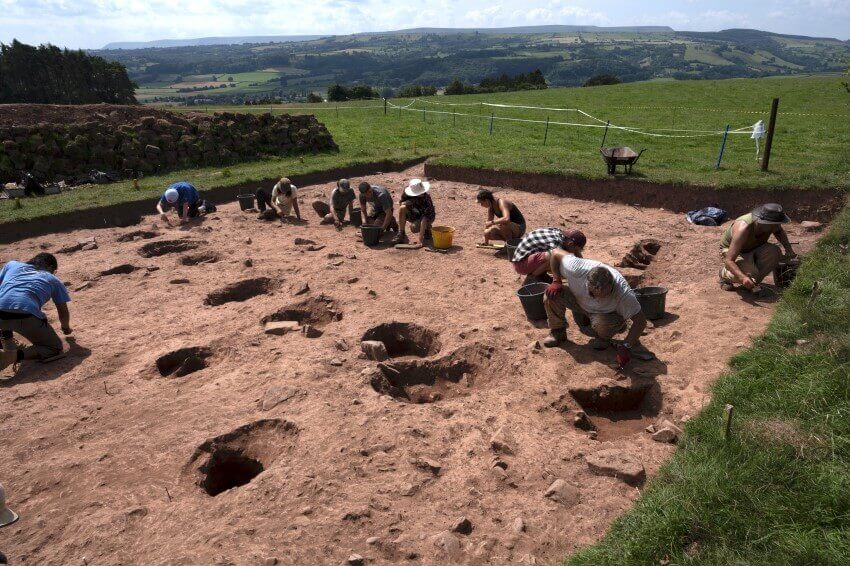 People doing archaeological digging at arthur's stone