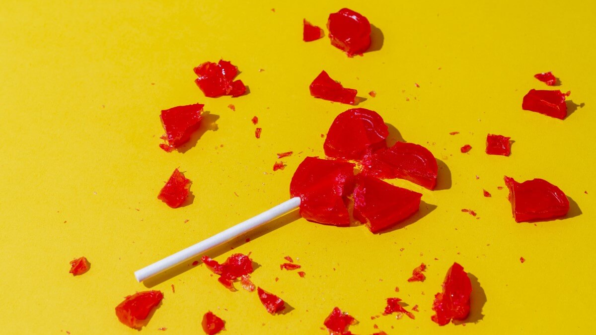 broken heart lollypop, representing breakup
