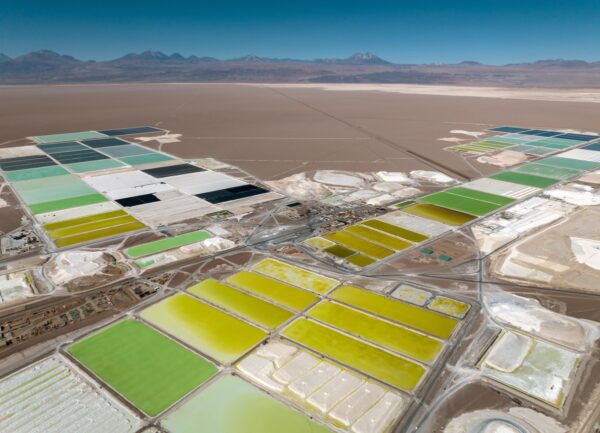 SALAR DE ATACAMA, CHILE - AUGUST 24: In this aerial view, pools of brine containing lithium carbonate and mounds of salt bi-product stretch through a lithium mine in the Atacama Desert on August 24, 2022 in Salar de Atacama, Chile.