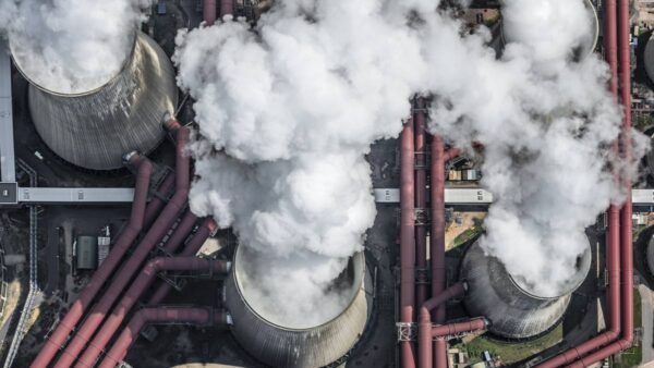 Steam emerges from a coal-fired power station's cooling towers in Germany.