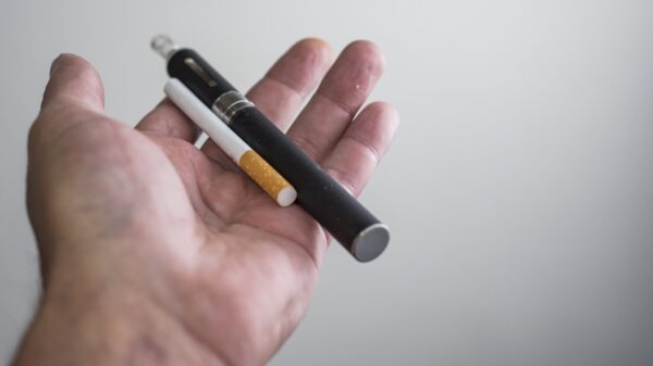 electronic cigarette or vaporiser as an alternative to tobacco - stock photo