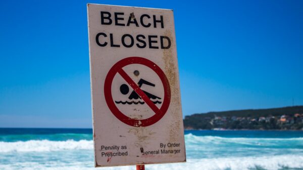 A beached closed sign